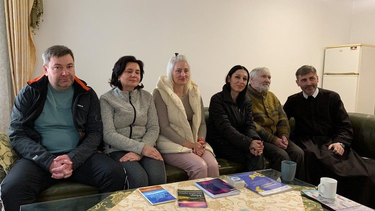 Andryi with his wife Tatiana, Yulia, Daria, Victor, and Fr Francis