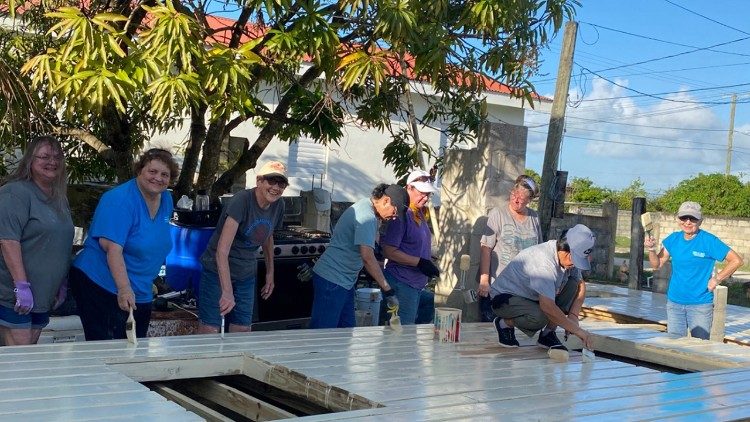 Sister Luke and the volunteers construct a house in Belize