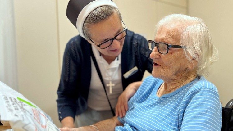 Sr. Agnieszka with a resident of the Aged Care - Holy Family Services